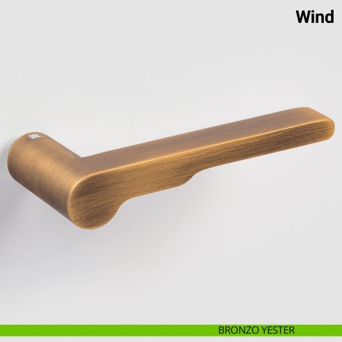Maniglia per porta Wind Nuda Verum Italy senza rosetta - bronzo yester