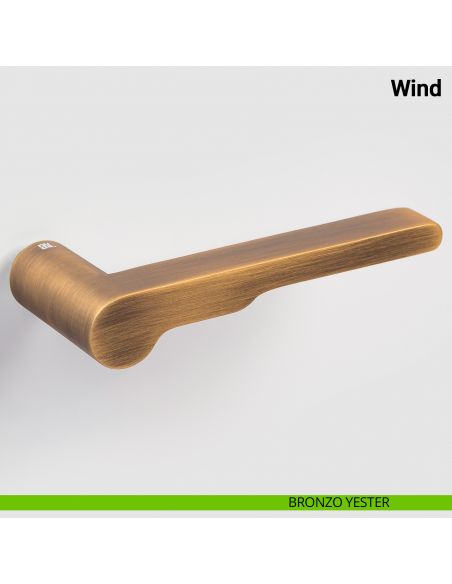 Maniglia per porta Wind Nuda Verum Italy senza rosetta - bronzo yester