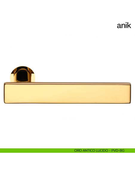 Maniglia per porta Anik dnd Handles con rosetta minimale oro antico lucido