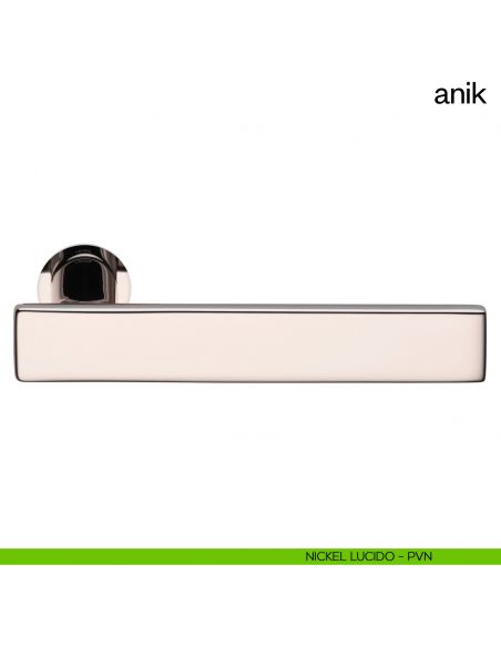 Maniglia per porta Anik dnd Handles con rosetta minimale nickel lucido