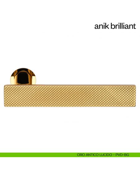 Maniglia per porta Anik Brilliant dnd Handles con rosetta minimale oro antico lucido