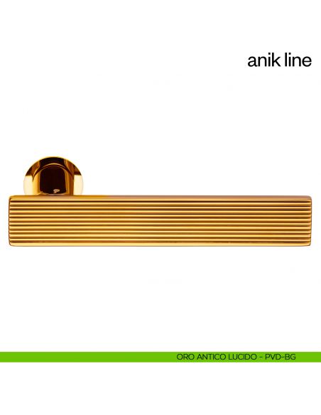 Maniglia per porta Anik Line dnd Handles con rosetta minimale oro antico lucido