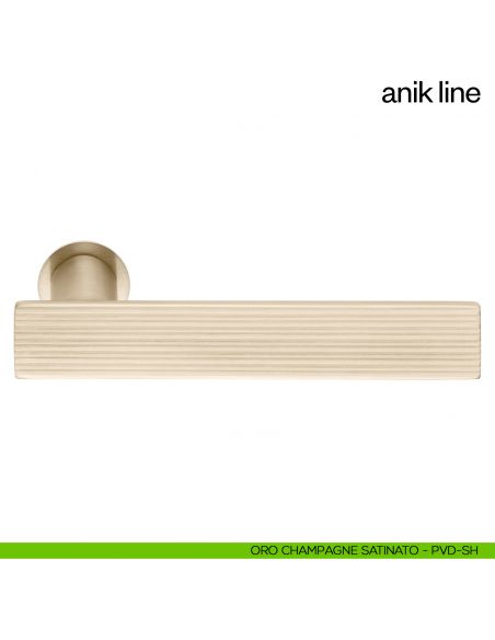 Maniglia per porta Anik Line dnd Handles con rosetta minimale oro champagne satinato