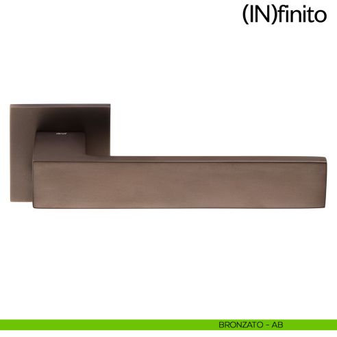 Maniglia per porta Infinito dnd handles con rosetta quadrata bronzato