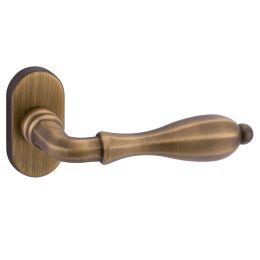 Maniglia per porta Epoca 800 Reguitti con rosetta ovale