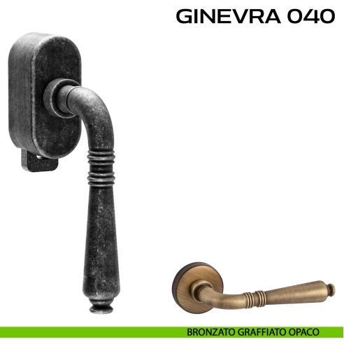 Maniglia per finestra DK con pulsante su placca Ginevra 040 Reguitti graffiato opaco