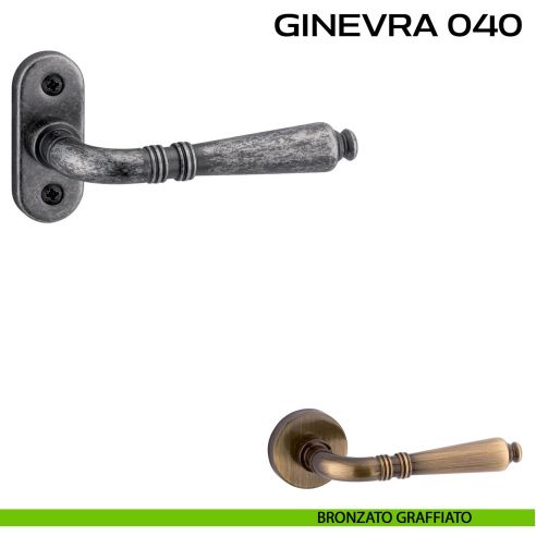 Maniglia per porta con viti a vista Ginevra 040 Reguitti con rosetta ovale bronzato