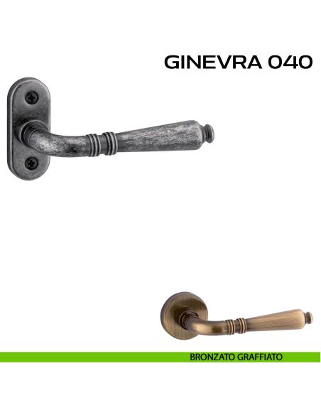 Maniglia per porta con viti a vista Ginevra 040 Reguitti con rosetta ovale bronzato