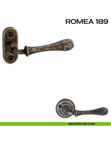 Maniglia per porta 189 Romea Reguitti con viti a vista e rosetta ovale argento