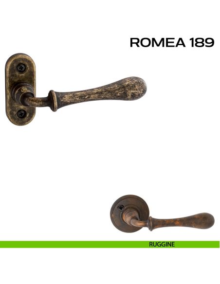 Maniglia per porta 189 Romea Reguitti con viti a vista e rosetta ovale ruggine