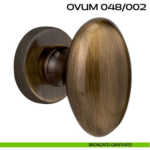 Pomolo ovale per porta fisso Ovum 048 Reguitti con rosetta tonda bronzato