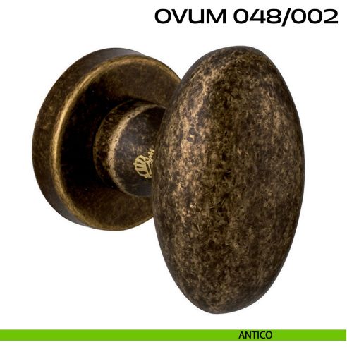 Pomolo ovale per porta fisso Ovum 048 Reguitti con rosetta tonda antico