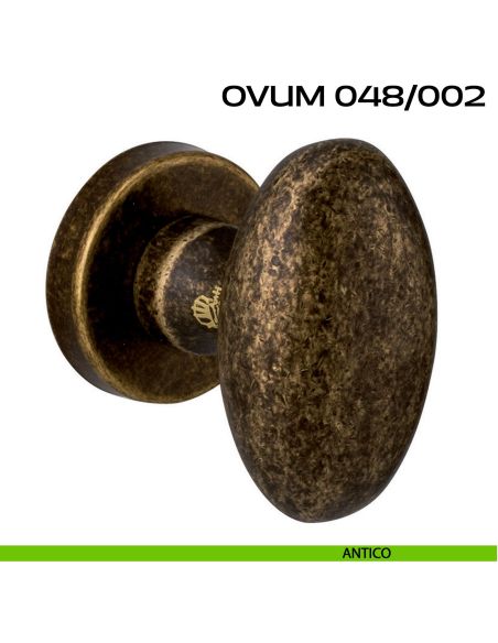 Pomolo ovale per porta fisso Ovum 048 Reguitti con rosetta tonda antico