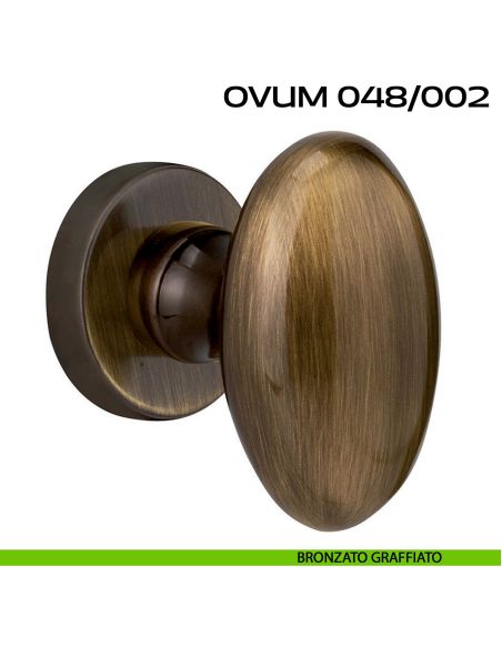 Pomolo ovale per porta girevole Ovum 048 Reguitti con rosetta tonda a pressione bronzato