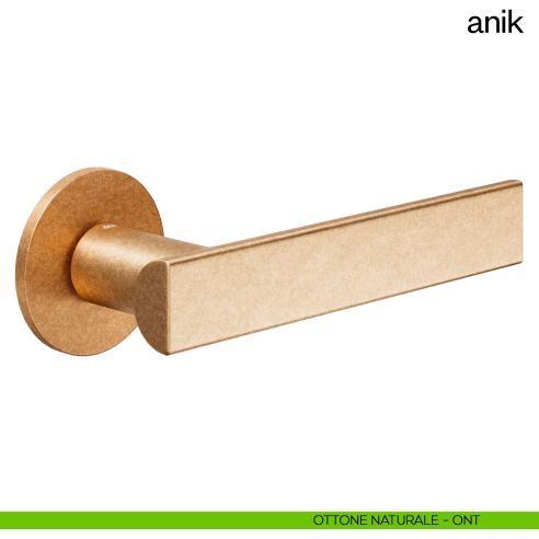 Maniglia per porta Anik dnd Handles ottone naturale