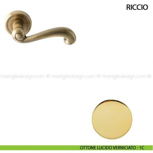 Maniglia per porta Riccio Comit ottone lucido verniciato