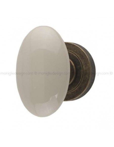 Pomolo per porta Ovalino Comit con porcellana avorio