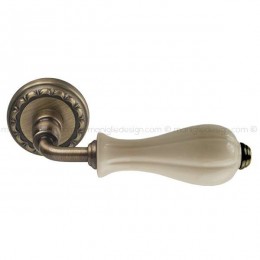 Maniglia per porta Zena Comit con porcellana avorio lucido