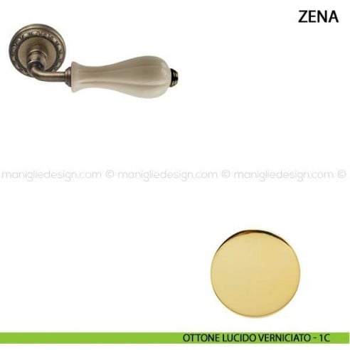 Maniglia per porta Zena Comit con porcellana avorio lucido ottone lucido verniciato