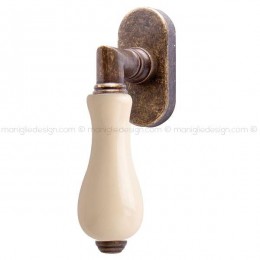 Maniglia per finestra martellina DK Barocco Comit porcellana avorio