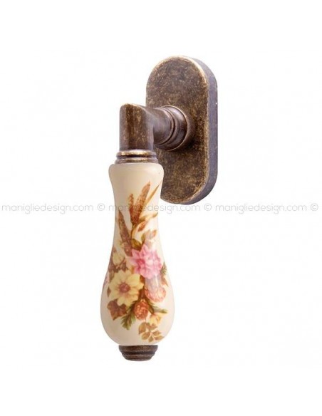 Maniglia per finestra martellina DK Barocco Comit porcellana avorio spiga di grano