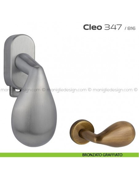 Maniglia per finestra DK con pulsante su placca 347 Cleo Reguitti bronzato graffiato