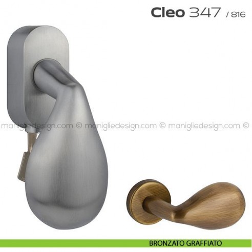 Maniglia per finestra martellina DK con chiave 347 Cleo Reguitti bronzato graffiato