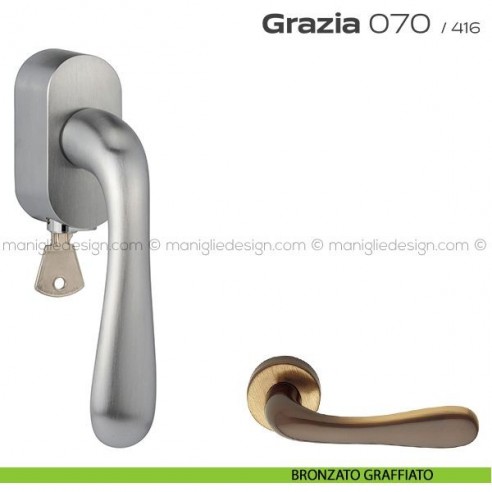 Maniglia per finestra martellina DK con chiave 070 Grazia Reguitti bronzato graffiato