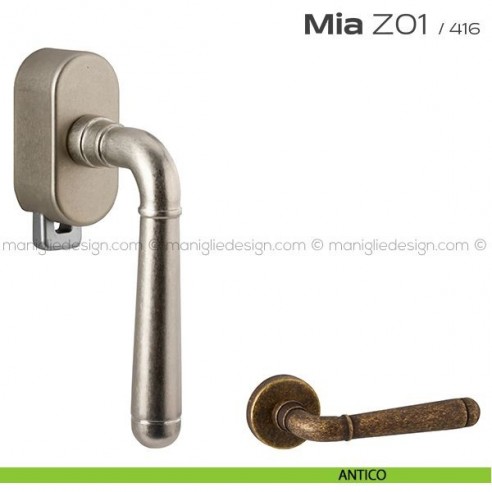 Maniglia per finestra DK con pulsante su placca Z01 Mia Reguitti antico