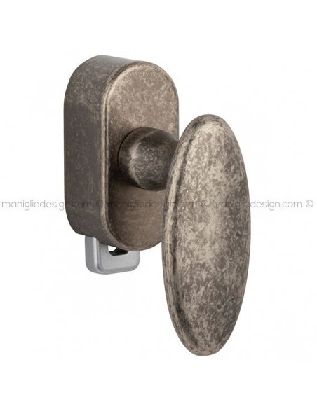 Maniglia per finestra DK con pulsante su placca 191 Ovalino Reguitti