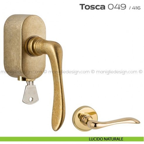 Maniglia per finestra martellina DK con chiave su placca 049 Tosca Reguitti lucido naturale