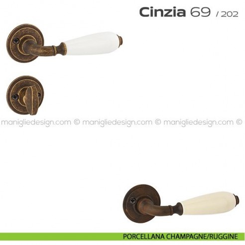 Maniglia in porcellana per porta con nottolino 069 Cinzia Reguitti con viti a vista porcellana champagne/ruggine