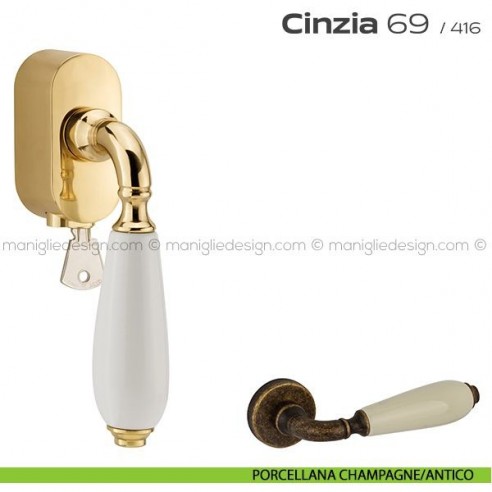 Maniglia per finestra martellina DK con chiave su placca 069 Cinzia Reguitti porcellana champagne/antico
