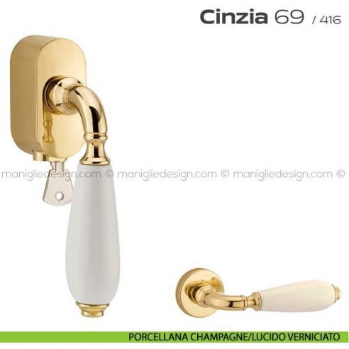 Maniglia per finestra martellina DK con chiave su placca 069 Cinzia Reguitti porcellana champagne/lucido verniciato