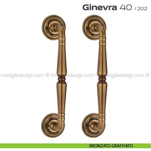Maniglione per porta 040 Ginevra Reguitti accoppiato con viti a vista bronzato graffiato