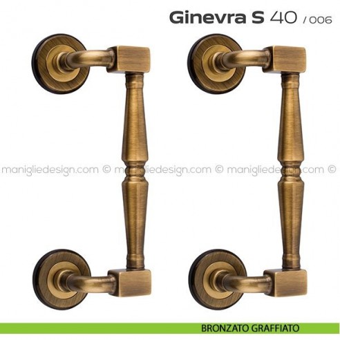 Maniglione per porta 040 Ginevra S Reguitti zancato accoppiato bronzato graffiato