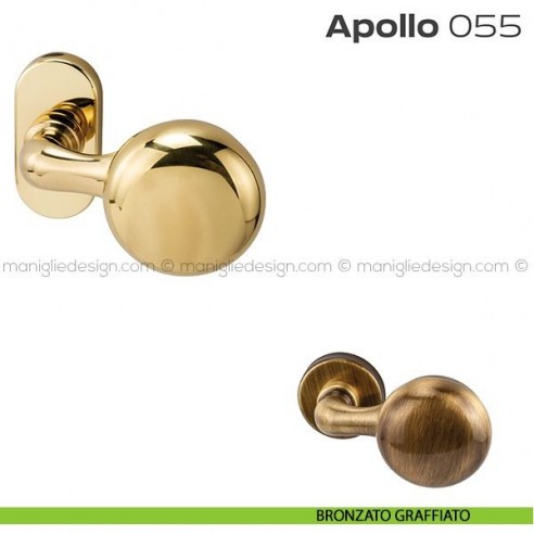 Pomolo per porta girevole 055 Apollo Reguitti con rosetta ovale a pressione bronzato graffiato