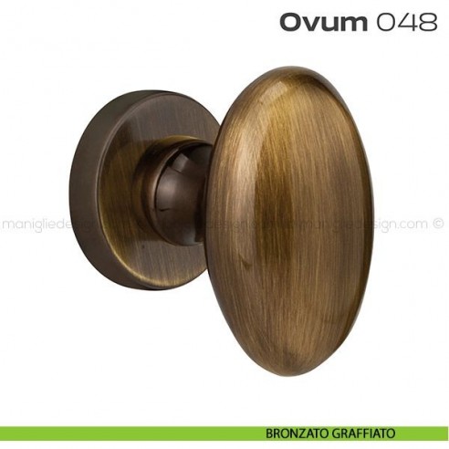 Pomolo ovale per porta fisso 048 Ovum Reguitti con rosetta tonda bronzato graffiato