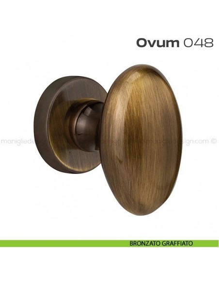 Pomolo ovale per porta fisso 048 Ovum Reguitti con rosetta tonda bronzato graffiato