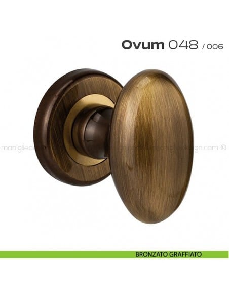 Pomolo ovale per porta girevole 048 Ovum Reguitti con rosetta tonda ad avvitare bronzato graffiato