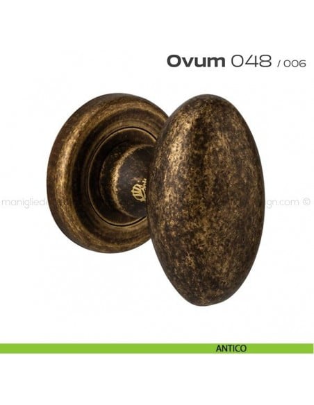 Pomolo ovale per porta girevole 048 Ovum Reguitti con rosetta tonda ad avvitare antico