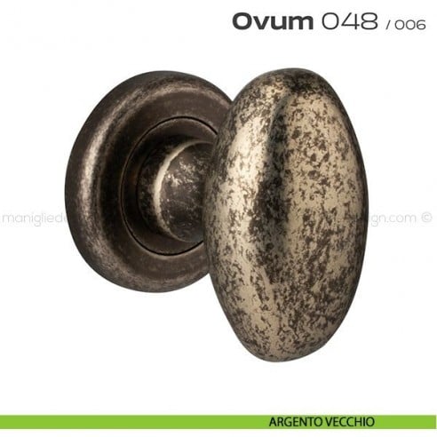 Pomolo ovale per porta girevole 048 Ovum Reguitti con rosetta tonda ad avvitare argento vecchio