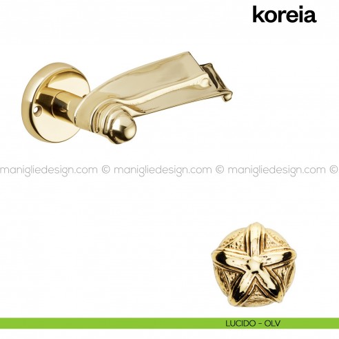 Maniglia per porta Koreia Poggi Mariani con rosetta tonda lucido - OLV