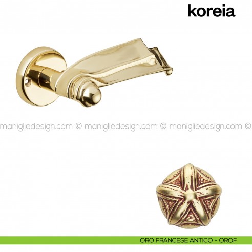 Maniglia per porta Koreia Poggi Mariani con rosetta tonda oro francese antico - OROF