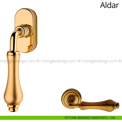 Maniglia per finestra martellina DK Aldar Linea Calì ottone bronzato graffiato