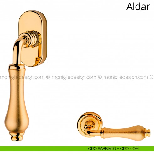 Maniglia per finestra martellina DK Aldar Linea Calì oro sabbiato + oro