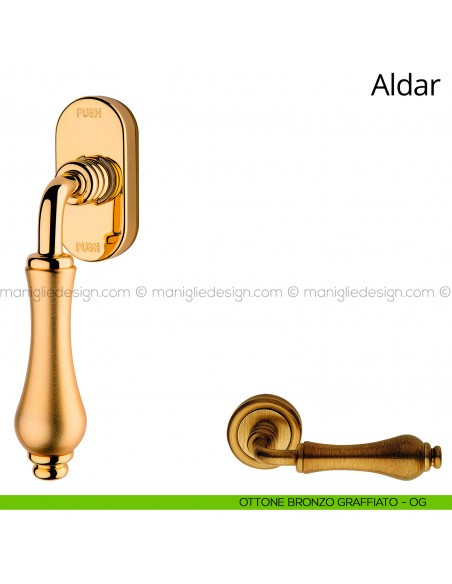 Maniglia per finestra martellina DK antintrusione Aldar Linea Calì ottone bronzato graffiato
