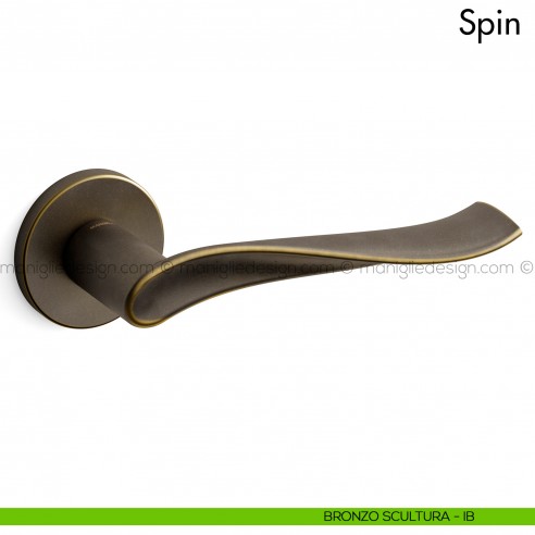 Maniglia per porta Spin Mandelli bronzo scultura