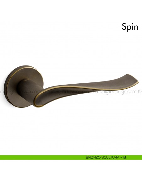Maniglia per porta Spin Mandelli bronzo scultura