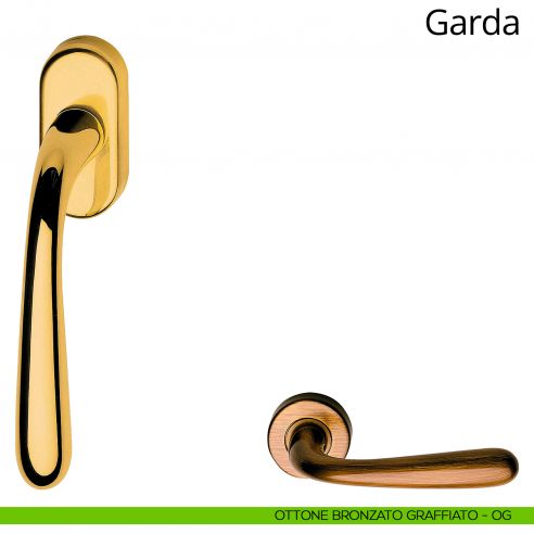 Maniglia per finestra martellina DK Garda Linea Calì ottone bronzato graffiato